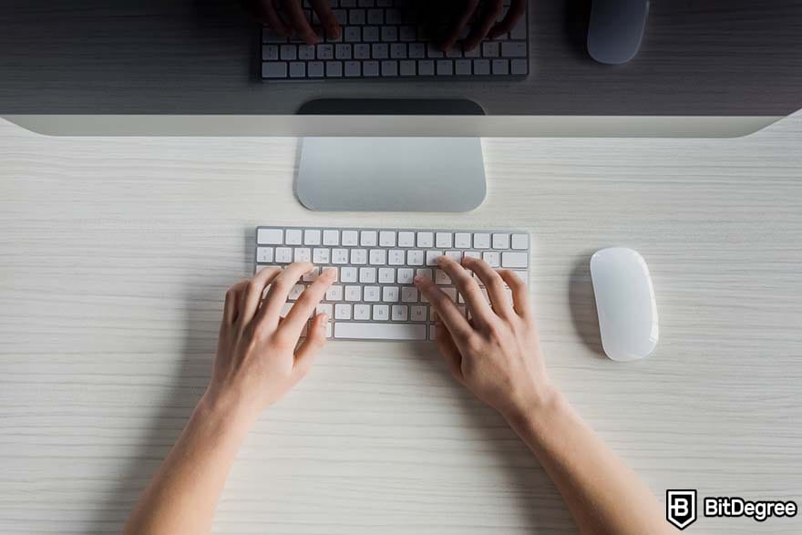 How to become a writer: typing on computer keyboard.