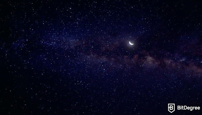 Online astronomy degree: dark night sky with a crescent moon
