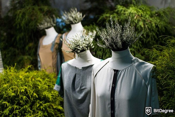 Online Fashion Design Courses: dress forms surrounded by foliage.
