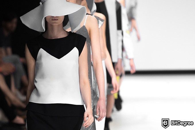 Online Fashion Design Courses: models walking down a runway.