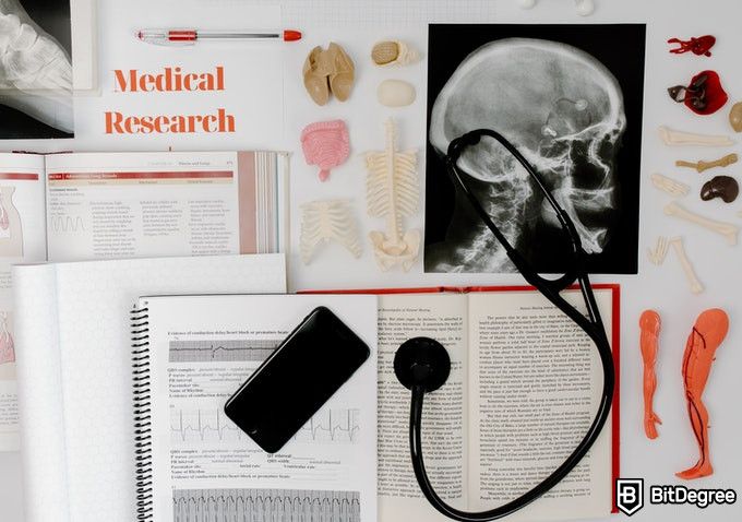 Online Health Degrees: medical research on a table.