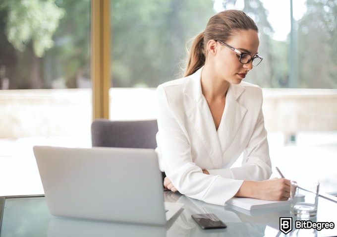 Online Healthcare Degrees: woman doing administrative work.