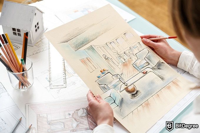 Online Interior Design Courses: woman looking at an interior sketch.