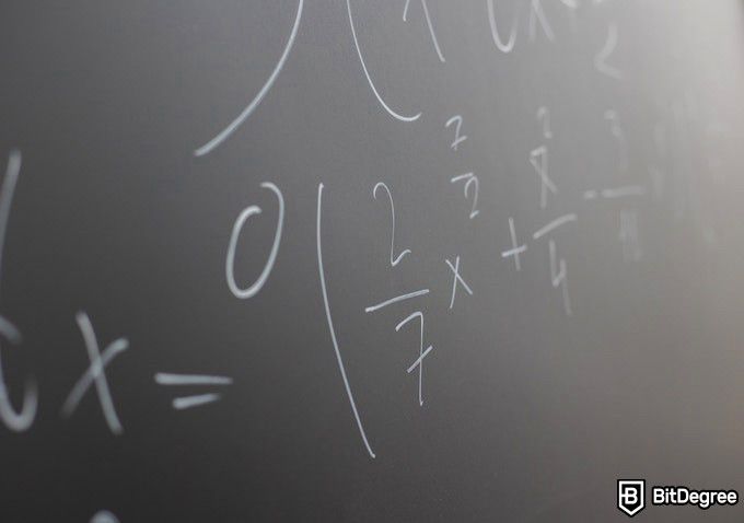 Online Math Courses: algebra written on a blackboard.