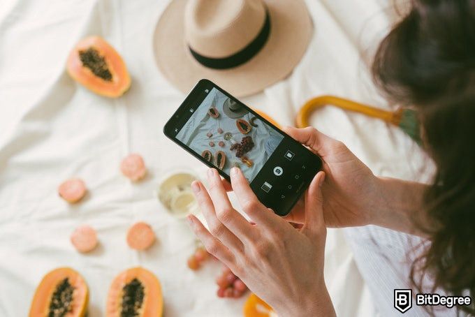 Online photography classes: taking a photo of fruits on mobile