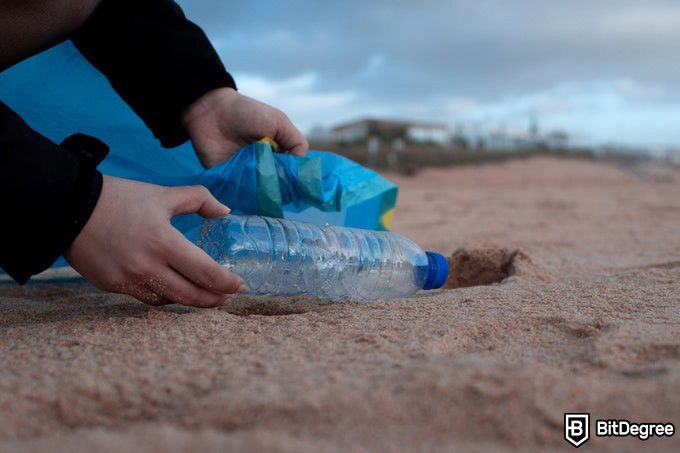 Online public health degree: picking trash on a beach