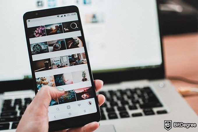 Online Social Media Courses: person scrolling through an Instagram profile.