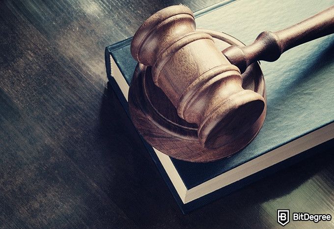 Online Law Courses: a gavel on a book.