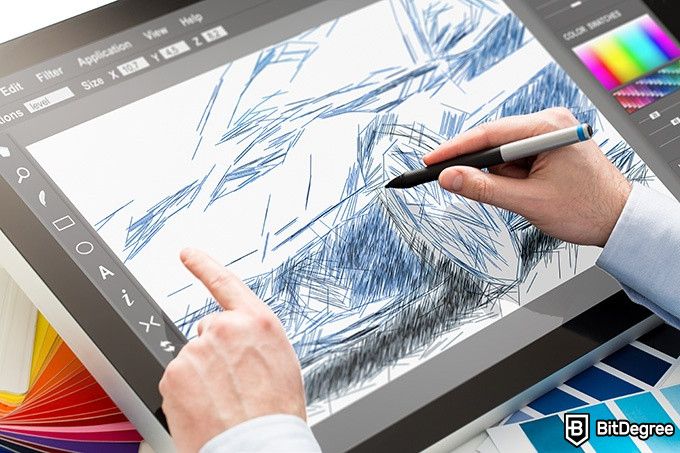 Курсы графического дизайна Skillshare: человек рисует на планшете.