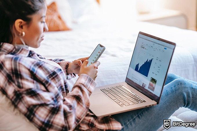 Best Udemy Excel Courses: woman working remotely with data analysis.