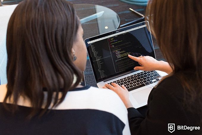 Best Udemy Excel Courses: two women programming.