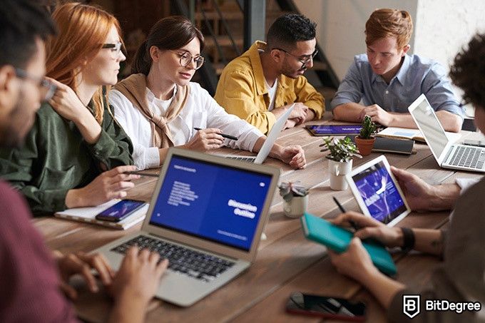 Udemy Python Course: colleagues working together.