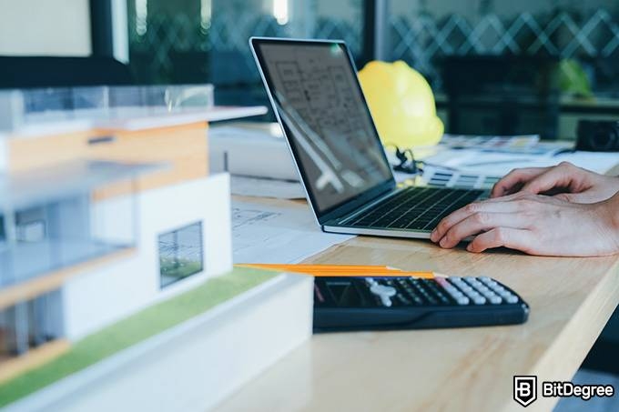 Engineering online degree: a person is preparing an engineering project on a laptop.