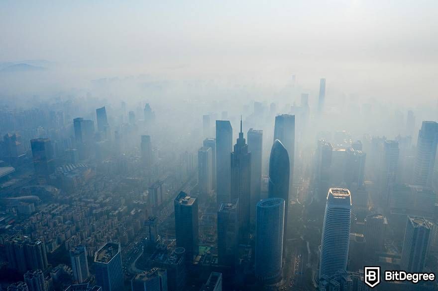 Online biology courses: a cityscape is covered in smog.